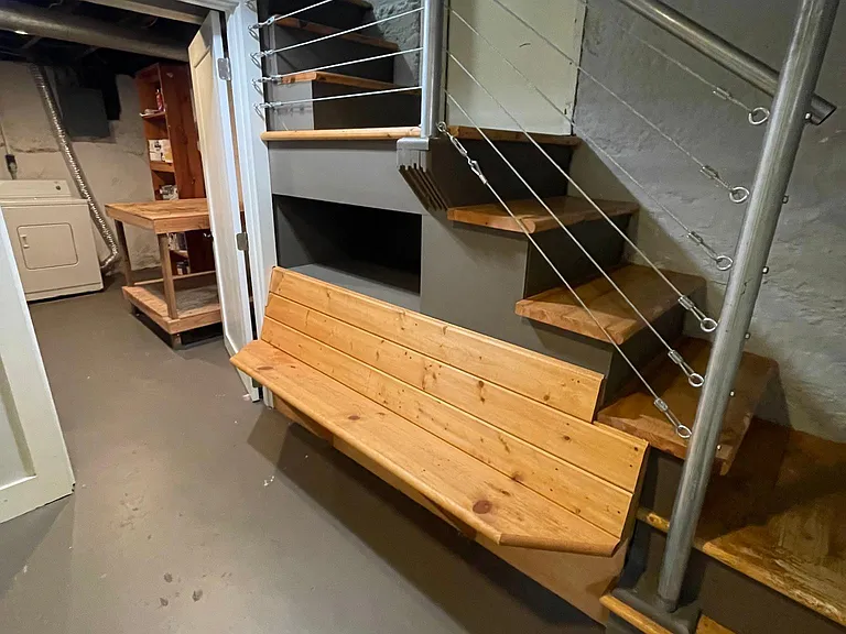 Stairs taking you to the basement and sitting area.