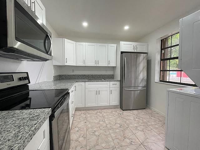 Totally new remodeled kitchen with new Washer & Dryer