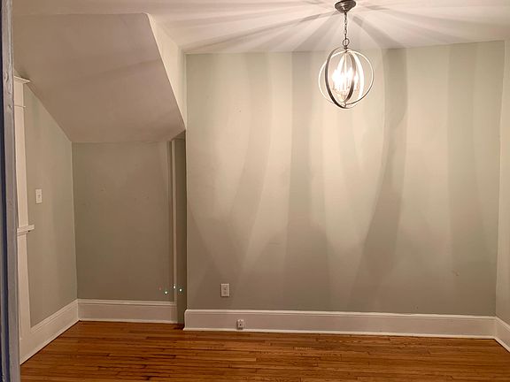 Foyer w/ Beautiful Pendant Lighting.