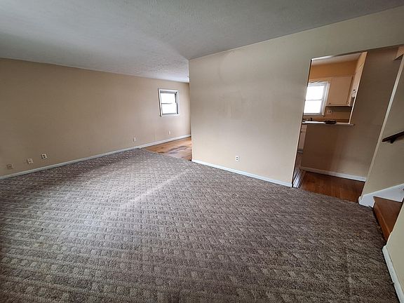 Living Room open to DR and Kitchen