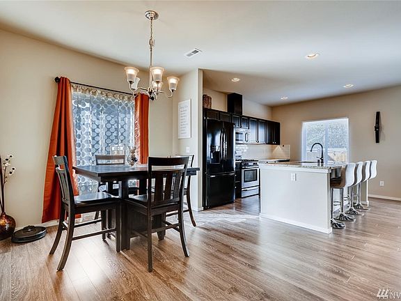 Pretty floors and a light and bright dining room