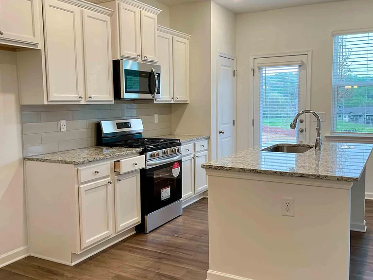 Open Kitchen with stainless steel appliances