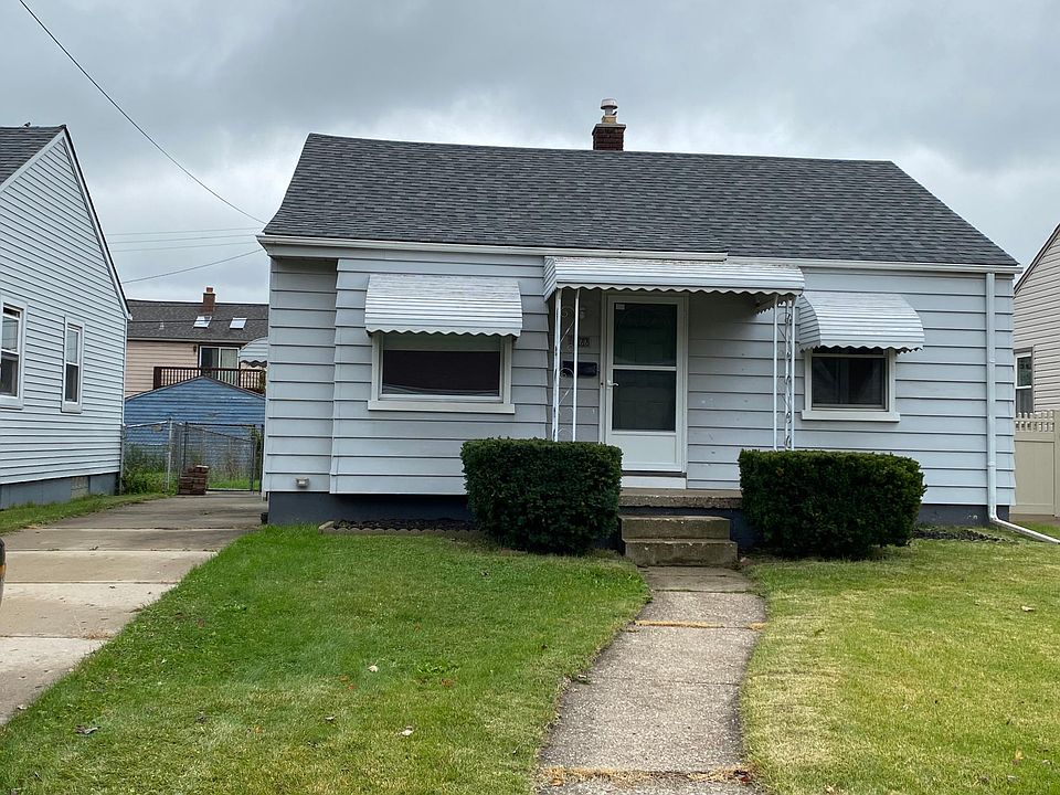 front of house/ driveway on side