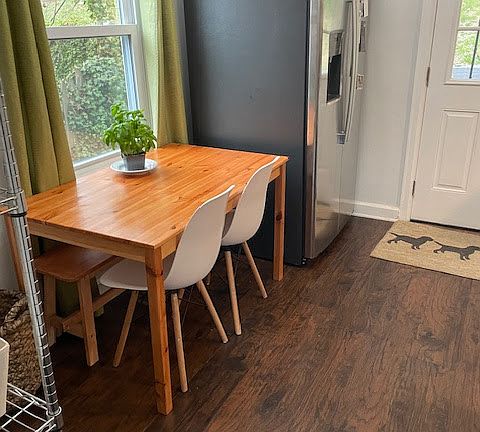 kitchen with access to covered porch and back yard and breakfast nook