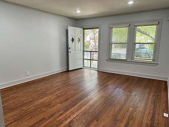 Unit B - Living Room Quite, original refinished hardwood floors