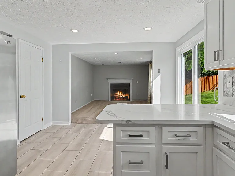 Kitchen looking into Family Room