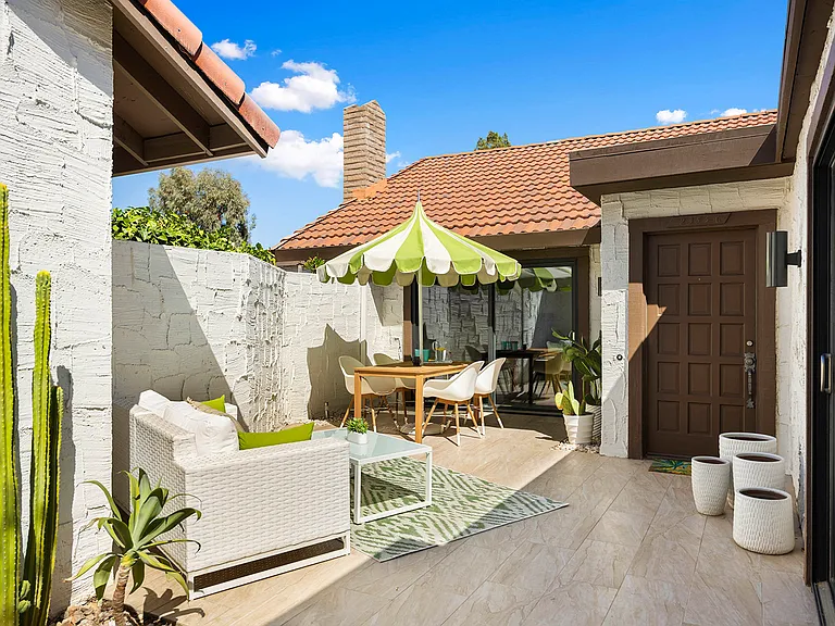 Front private patio with direct access to pool and spa.