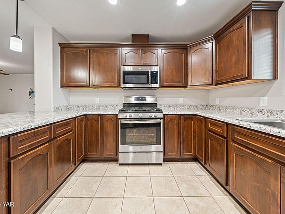 5th image of 10253 E 34th St
