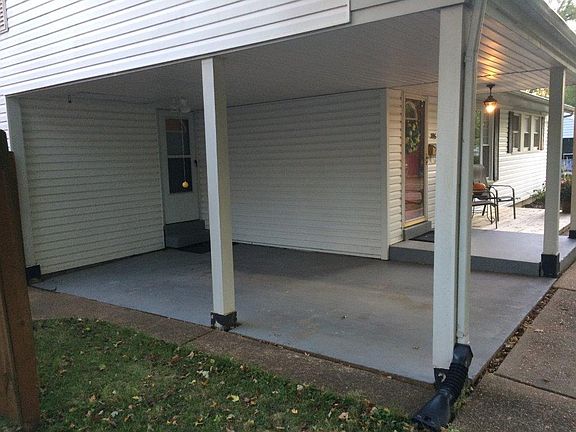 Carport with door directly to kitchen