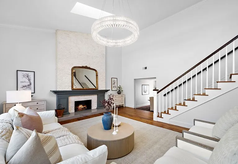 Spacious living room with soaring ceilings and abundant natural light_*Note: home will be delivered unfurnished.