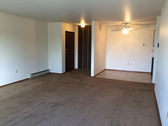 Living area looking into the dining area and to the front en