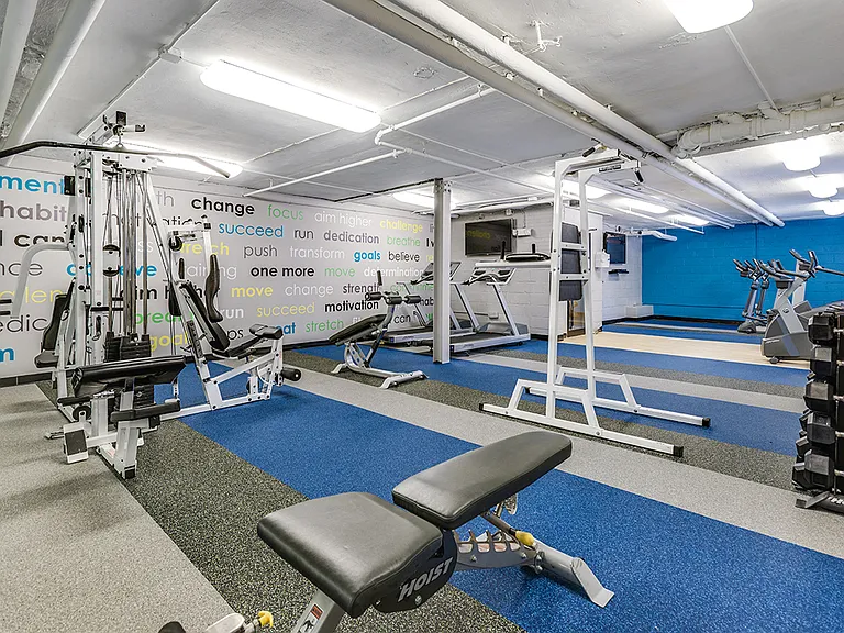 Fitness center with treadmills, machines and free weights