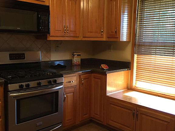 Kitchen with window seat and storage 