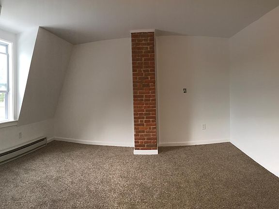 2 out of 3 bedrooms have exposed brick 