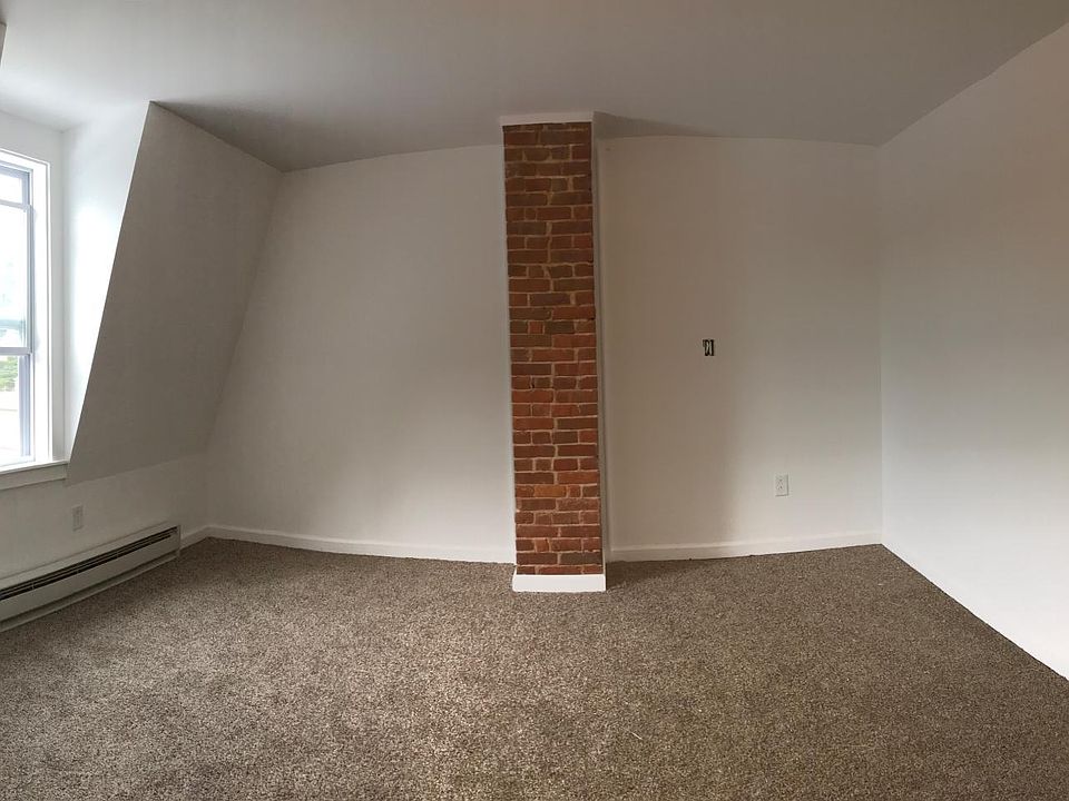 2 out of 3 bedrooms have exposed brick 