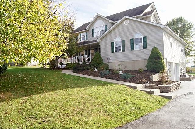 Front of home.  Driveway recently sealed.