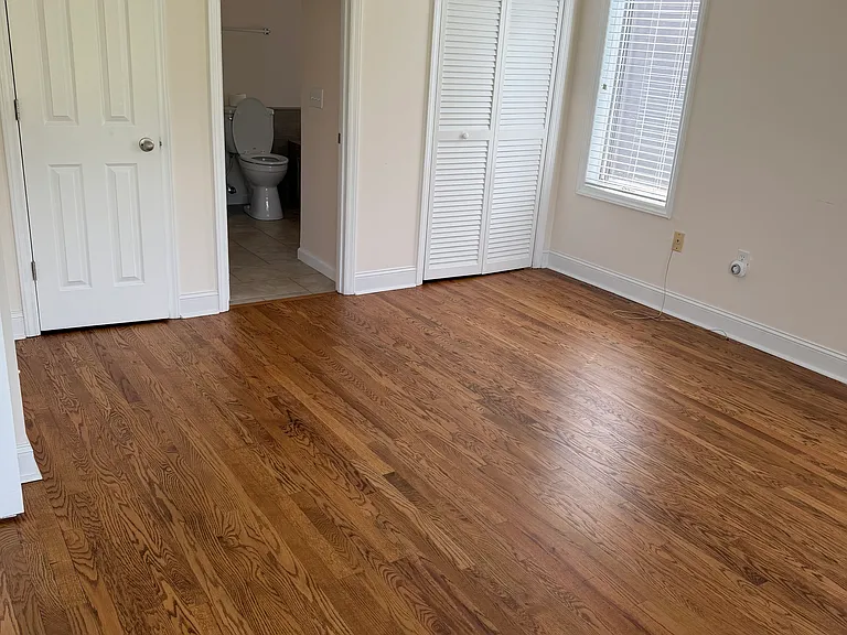 Primary bedroom with full bath. Fits up to a king bed