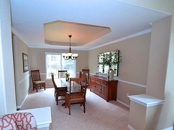 Architectural features throughout this well thought out two story