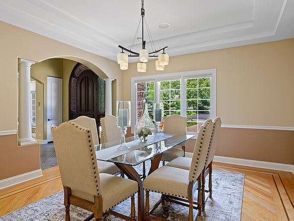 Chair Rail Millwork, Double Tray Ceiling, Elegant Chandelier