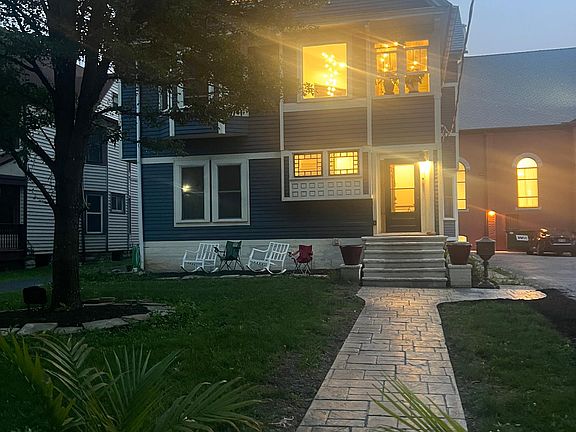 front photo. second floor uses front door but has a back stairway also.