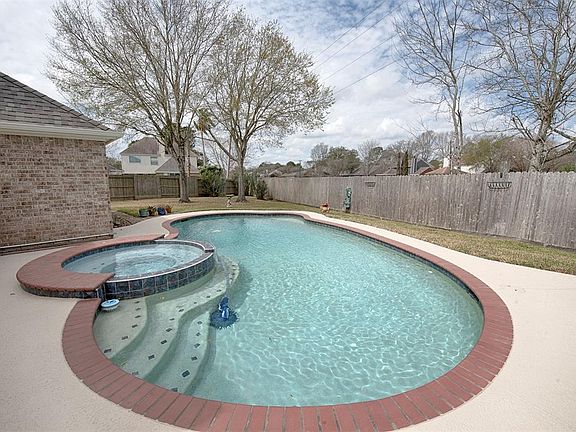 Home has amazing hot tub and pool to enjoy in the upcoming warmer months.