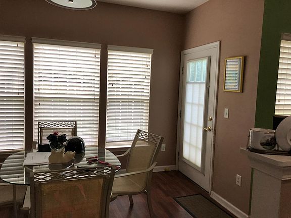 Sun room off kitchen with access to back door to porch