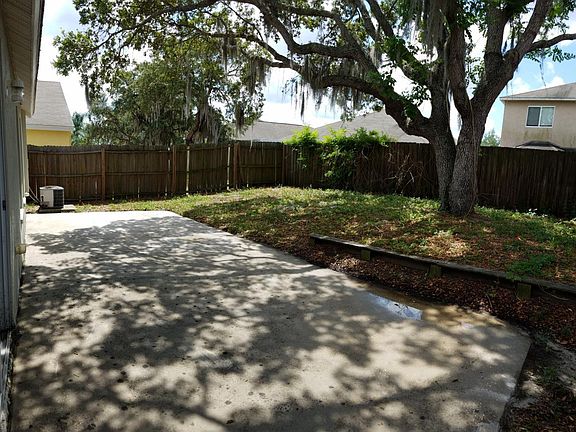 oversized shaded patio & Fenced yard