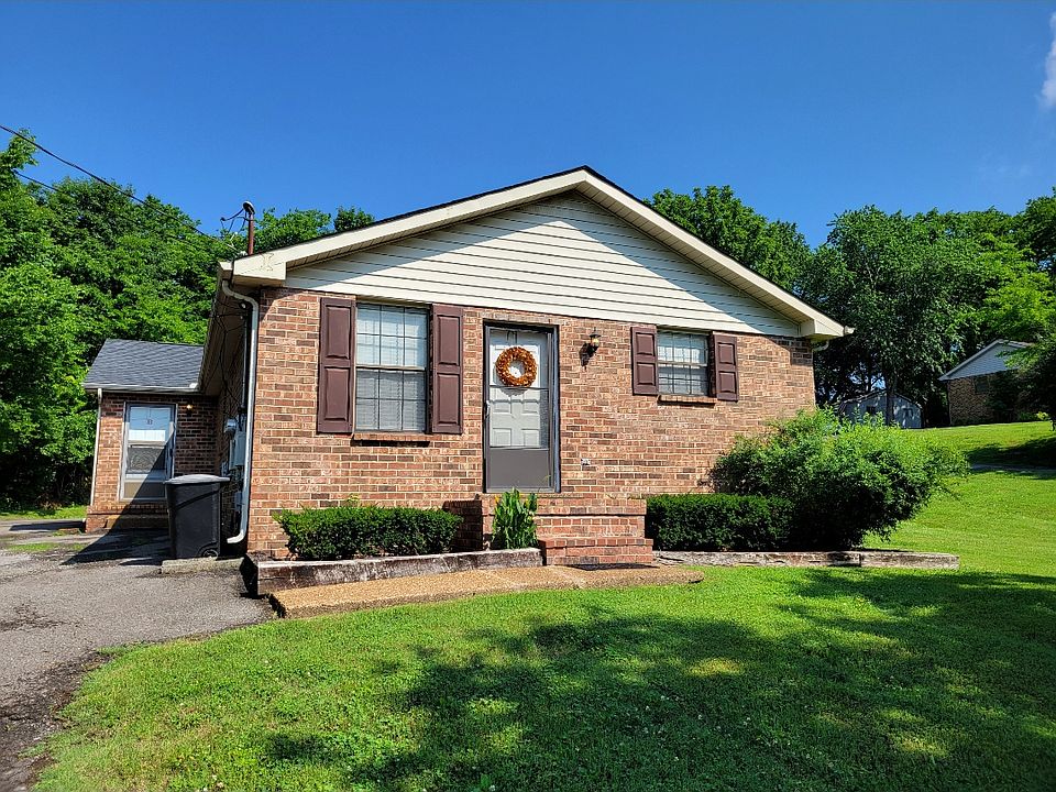 Front of duplex, on left side is unit B's front door