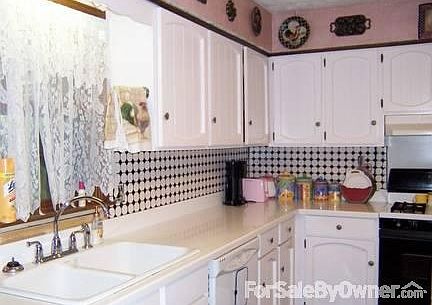 New solid surface countertop and porcelain back splash