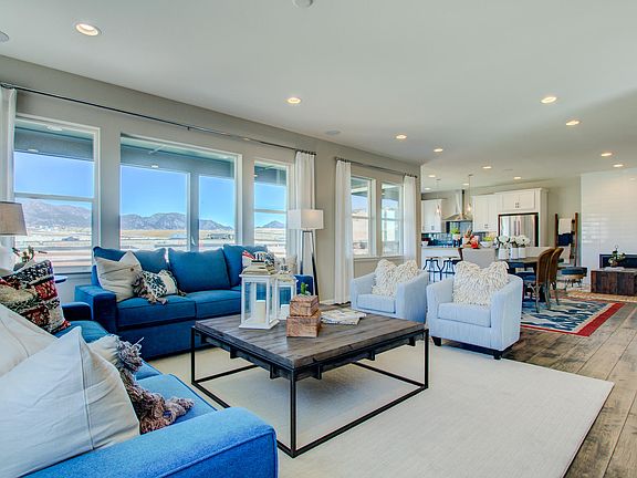 Example of Residence 4024 Great Room Dining Room - Colors and finishes will vary on actual hom