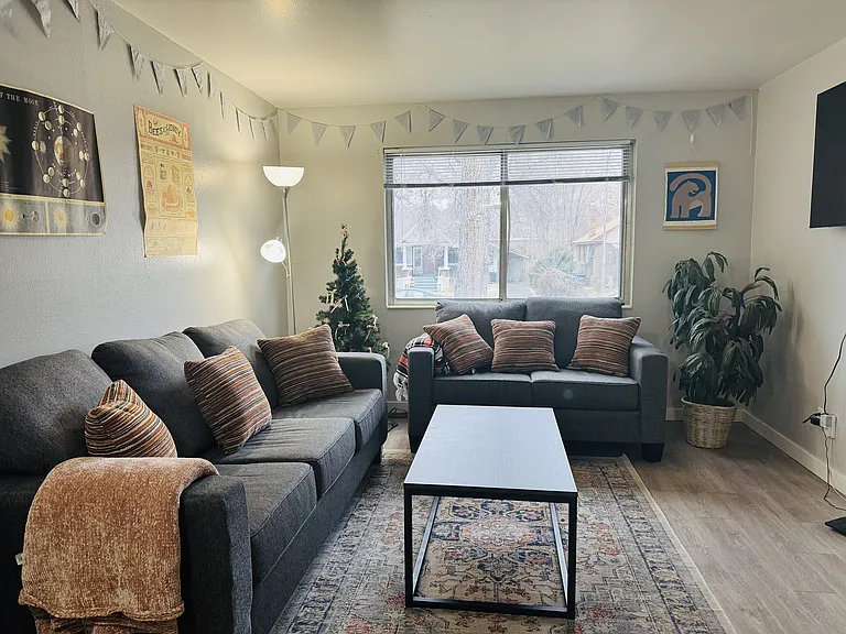 Experience relaxation in this cozy living area, perfect for unwinding and enjoying the view.