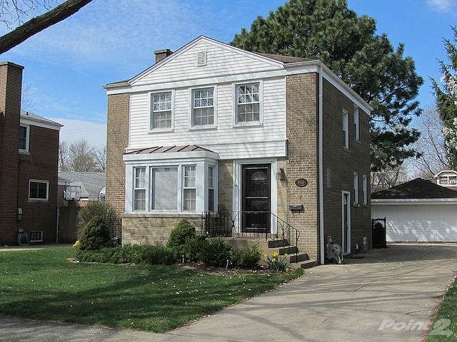 All brick & a fenced yard...