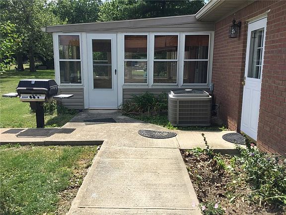 Gas Grill just outside the sunroom and back door.