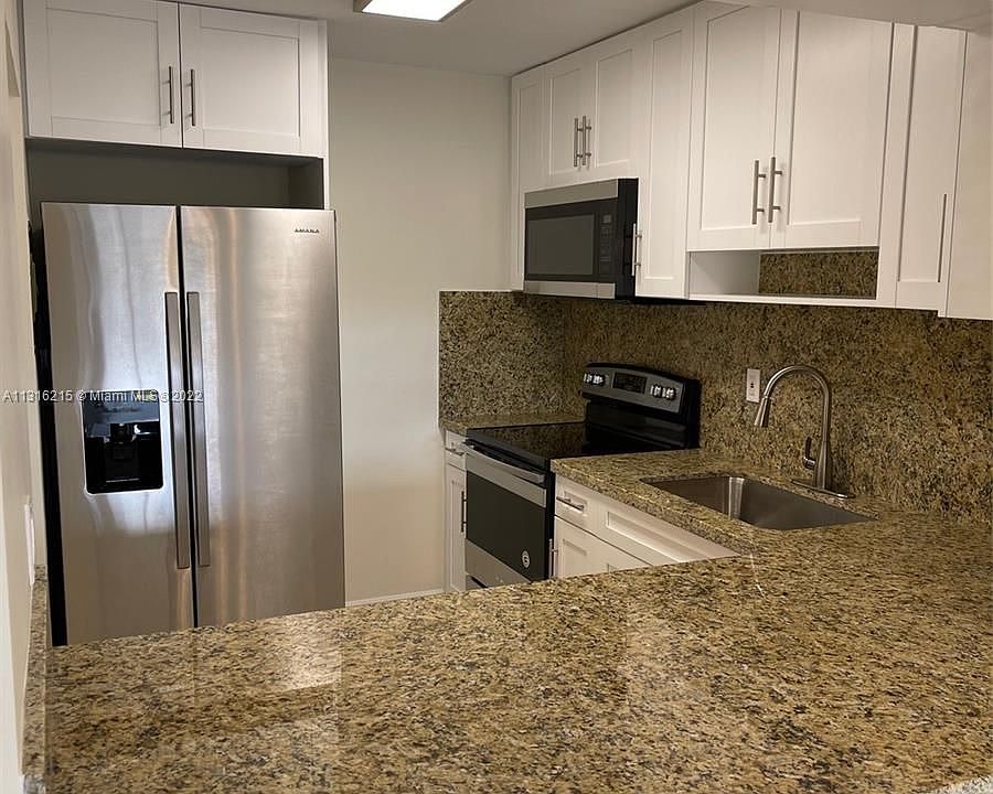 1st image of 6090 W 18th Ave APT 332