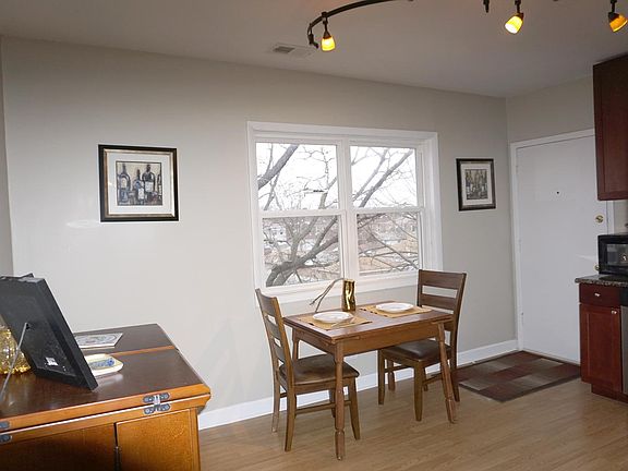 Kitchen 15' x 12' - Gas Stove, Dishwasher, Microwave and Garbage Disposal. Exit door to Washtenaw Ave.
