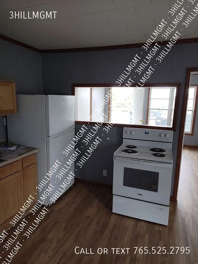 Building Photo - 5600 W Kilgore Ave #F-102