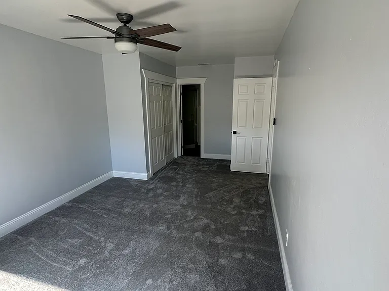 Primary Bedroom (10.5 x 19.5), approximately 13 feet from this wall to where the closet begins