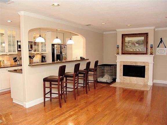 Den with Breakfast Bar and Fireplace