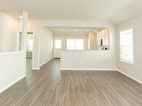 Family Room to Kitchen and Dining Area