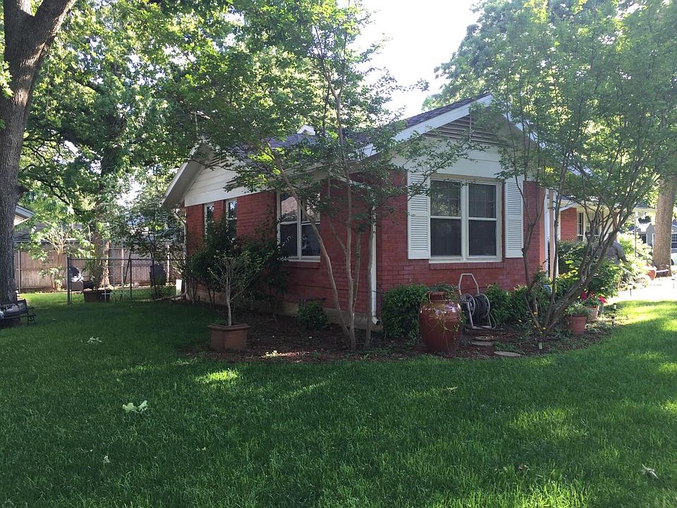 Side of the house and backyard