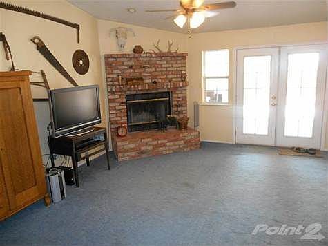 Comfortable combination living room and family says "relax" and enjoy.