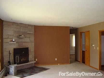 Living room
						:
						Fireplace insert for additional home heating