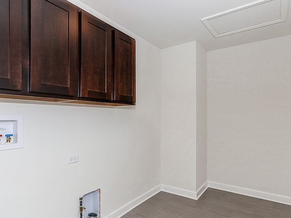 Laundry room with cabinet space