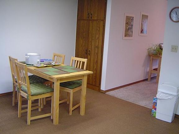 Large built-in oak pantry in kitchen