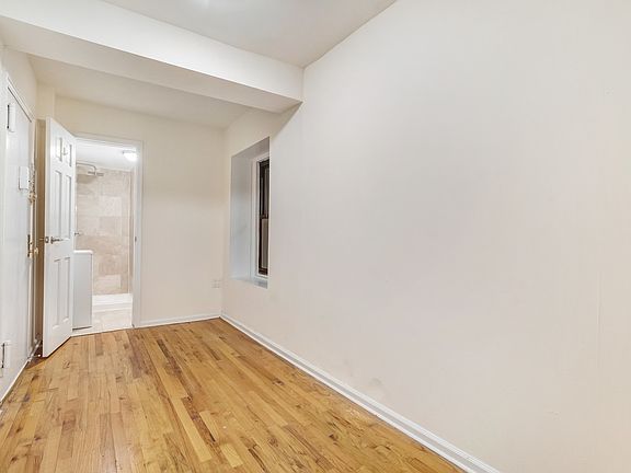 3rd image of 209 E 10th St APT 2B