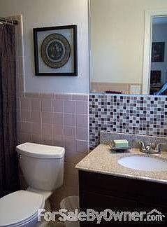 Master bathroom, granite countertops : new toilet, vanity + tile flooring