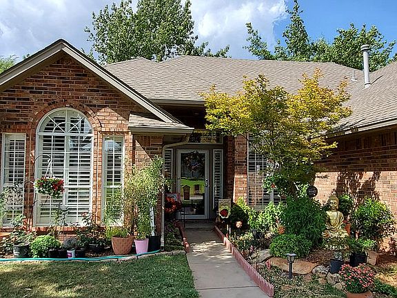 Extensive beautiful entry landscaping