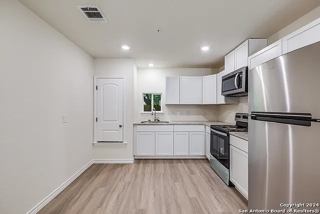 7302 Mary Abbott St #104 — Photo 4
