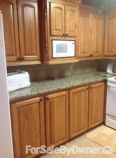 Oak cabinets and granite countertops