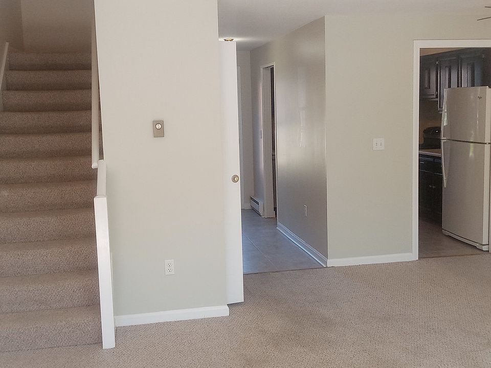 Unit front entrance view into the living/dining area.